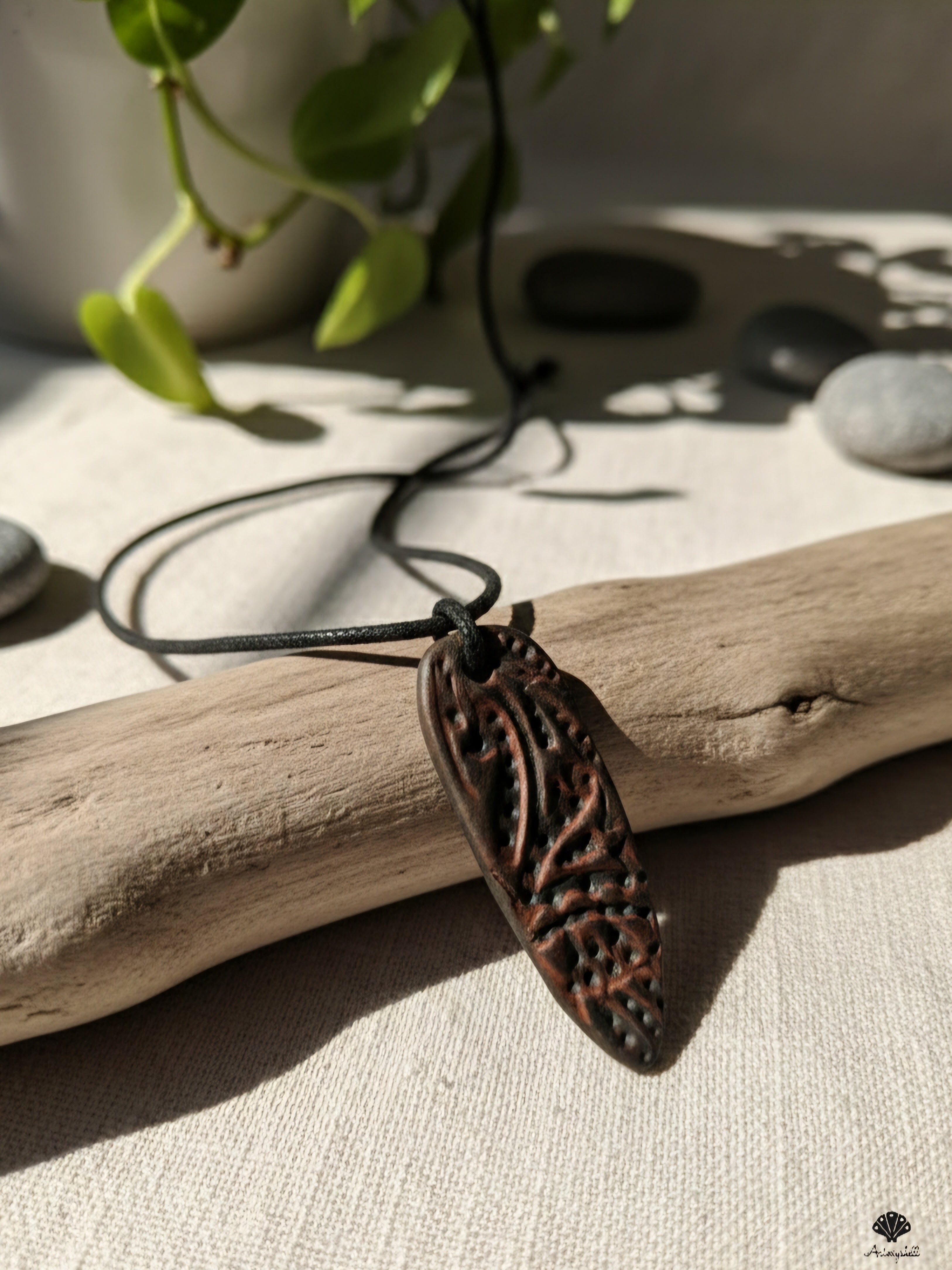 The 'Ancient Vine' Hand-Carved Terra Botanical Pendant