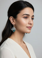 Square resin dangle earrings featuring crystal beads and preserved teal flowers